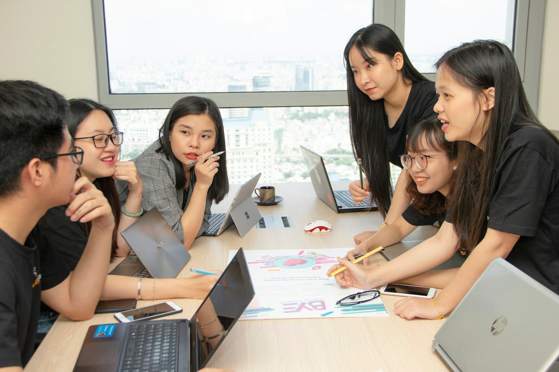 Asian colleagues working together around a table